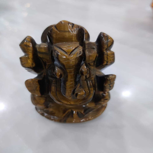 Tiger Eye Ganpati (185 gms@16/gm)
